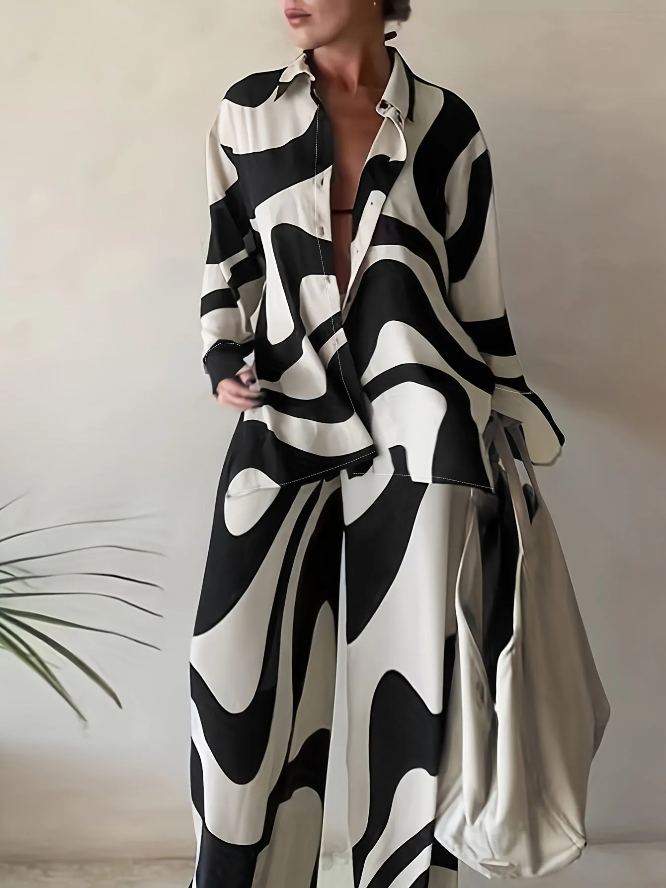 Plus Size Abstract Stripe Print Two-Piece Set - Button Up Long Sleeve Lapel Collar Shirt Top & High Rise Wide Leg Pant Ensemble for Casual Elegance