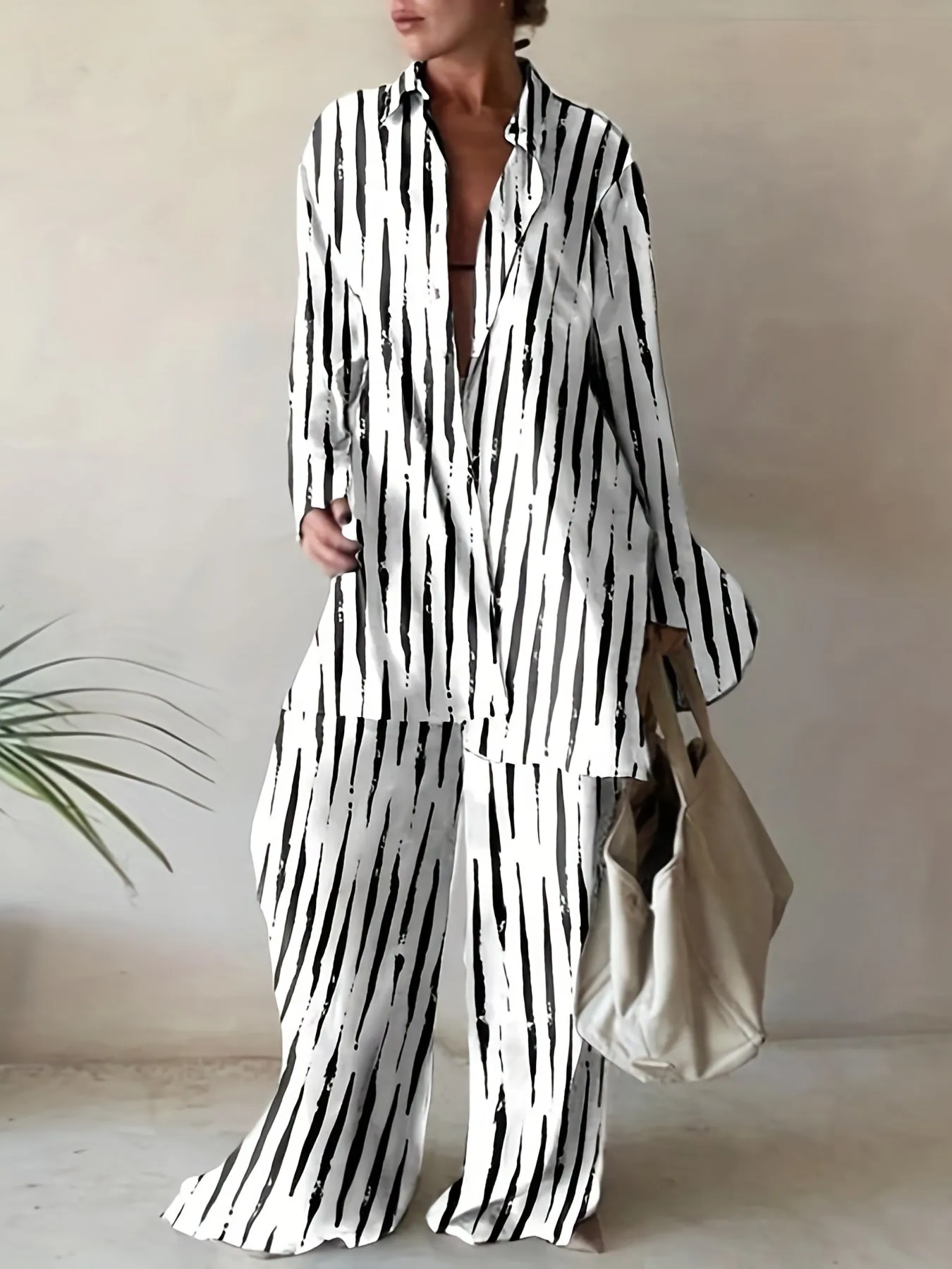 Plus Size Abstract Stripe Print Two-Piece Set - Button Up Long Sleeve Lapel Collar Shirt Top & High Rise Wide Leg Pant Ensemble for Casual Elegance