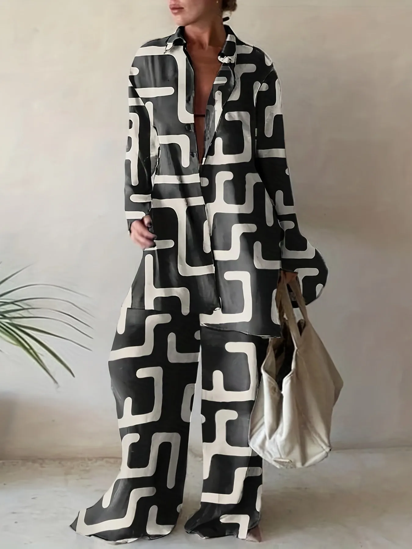 Plus Size Abstract Stripe Print Two-Piece Set - Button Up Long Sleeve Lapel Collar Shirt Top & High Rise Wide Leg Pant Ensemble for Casual Elegance