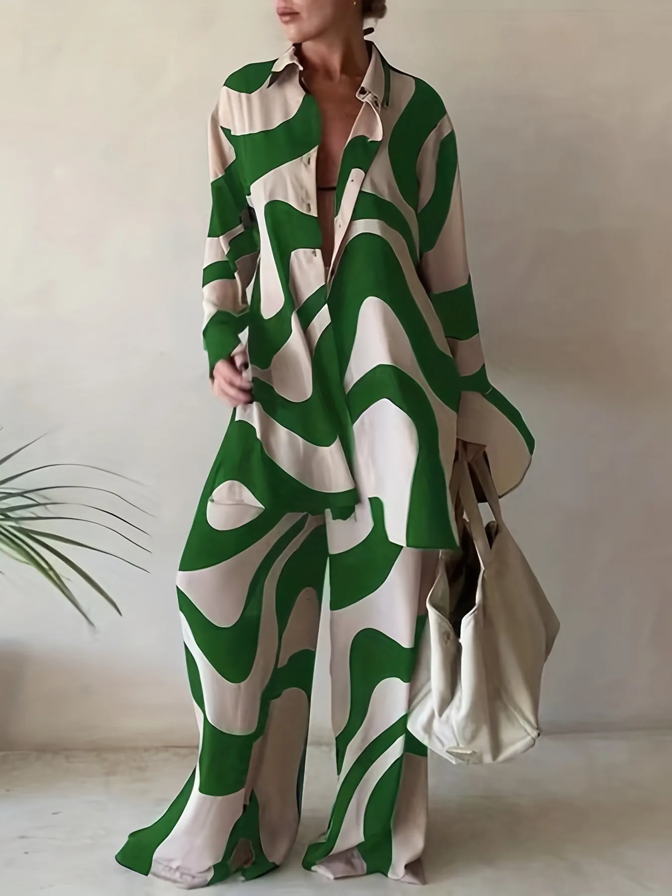 Plus Size Abstract Stripe Print Two-Piece Set - Button Up Long Sleeve Lapel Collar Shirt Top & High Rise Wide Leg Pant Ensemble for Casual Elegance