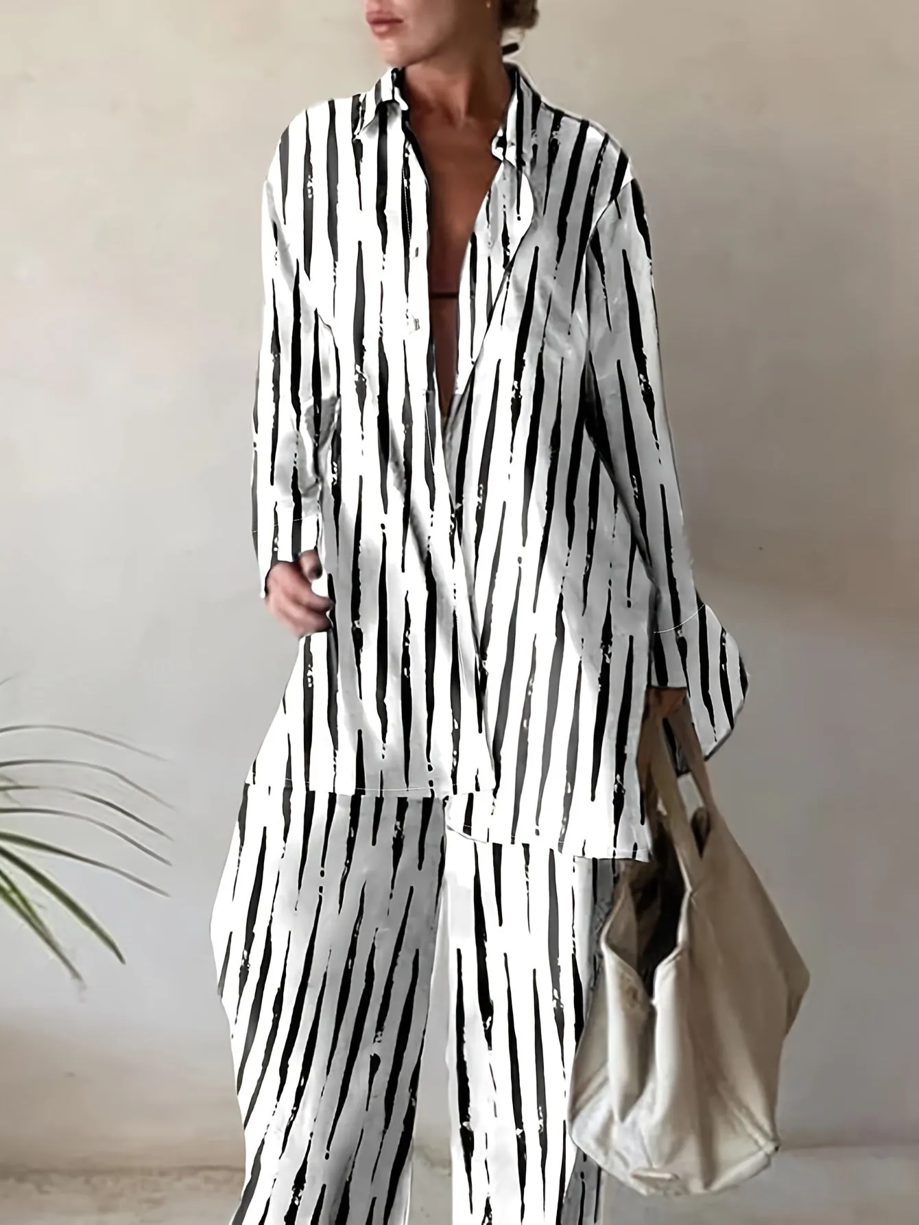 Plus Size Abstract Stripe Print Two-Piece Set - Button Up Long Sleeve Lapel Collar Shirt Top & High Rise Wide Leg Pant Ensemble for Casual Elegance