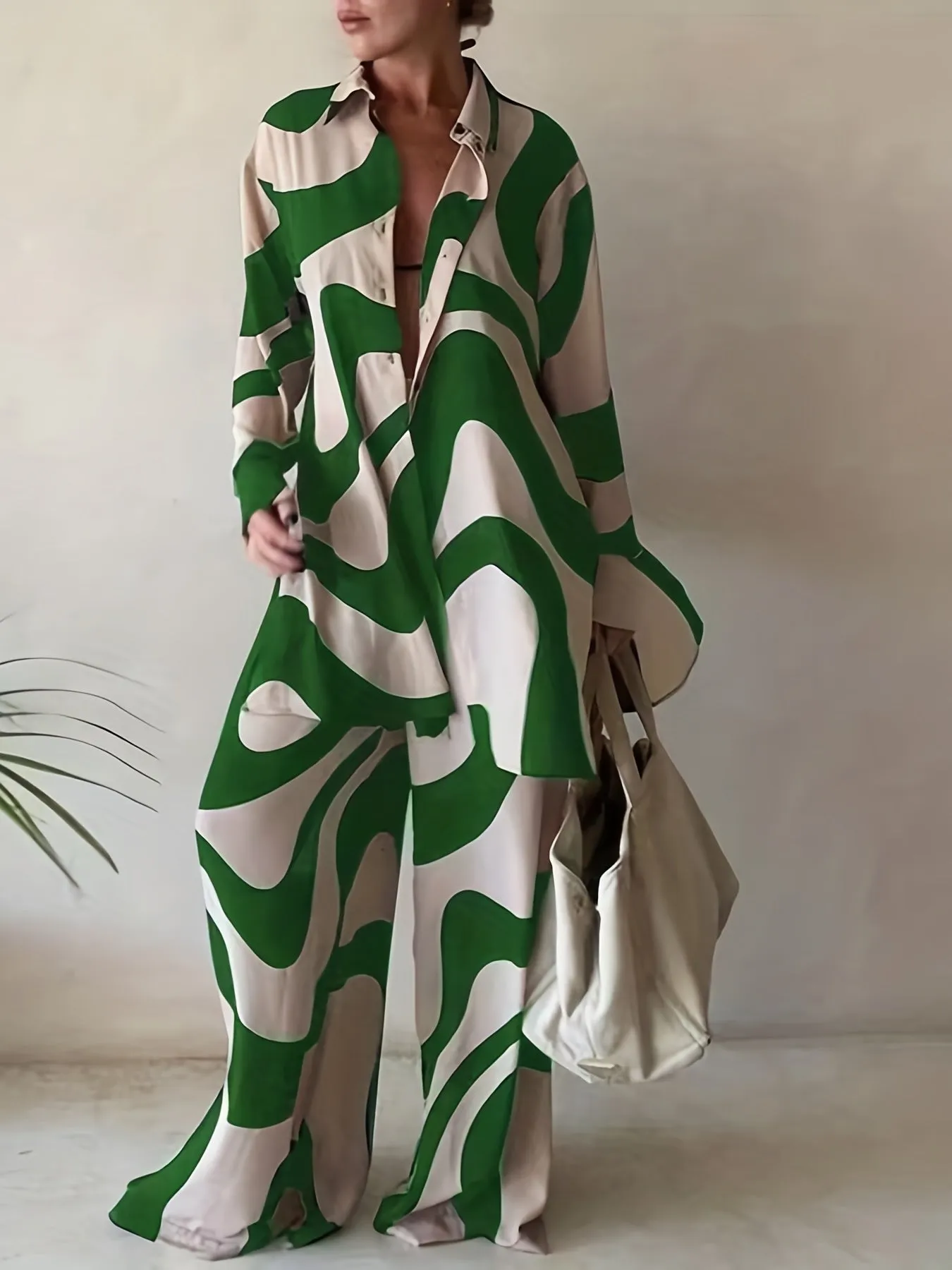 Plus Size Abstract Stripe Print Two-Piece Set - Button Up Long Sleeve Lapel Collar Shirt Top & High Rise Wide Leg Pant Ensemble for Casual Elegance